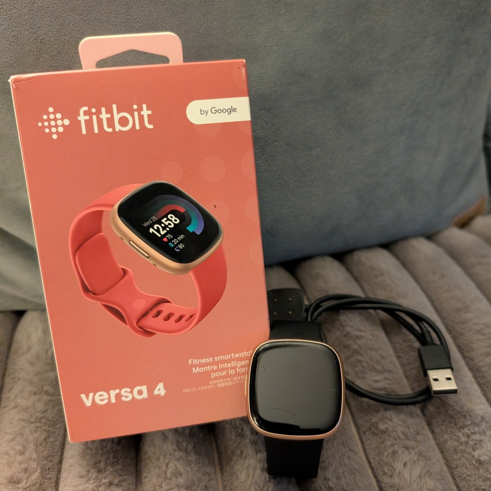 Fitbit Versa 4 Smartwatch - Black and Gold